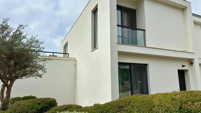 Ocean House with a balcony